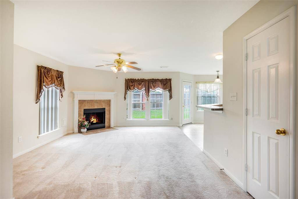 Living Room with nice Corner Fireplace!