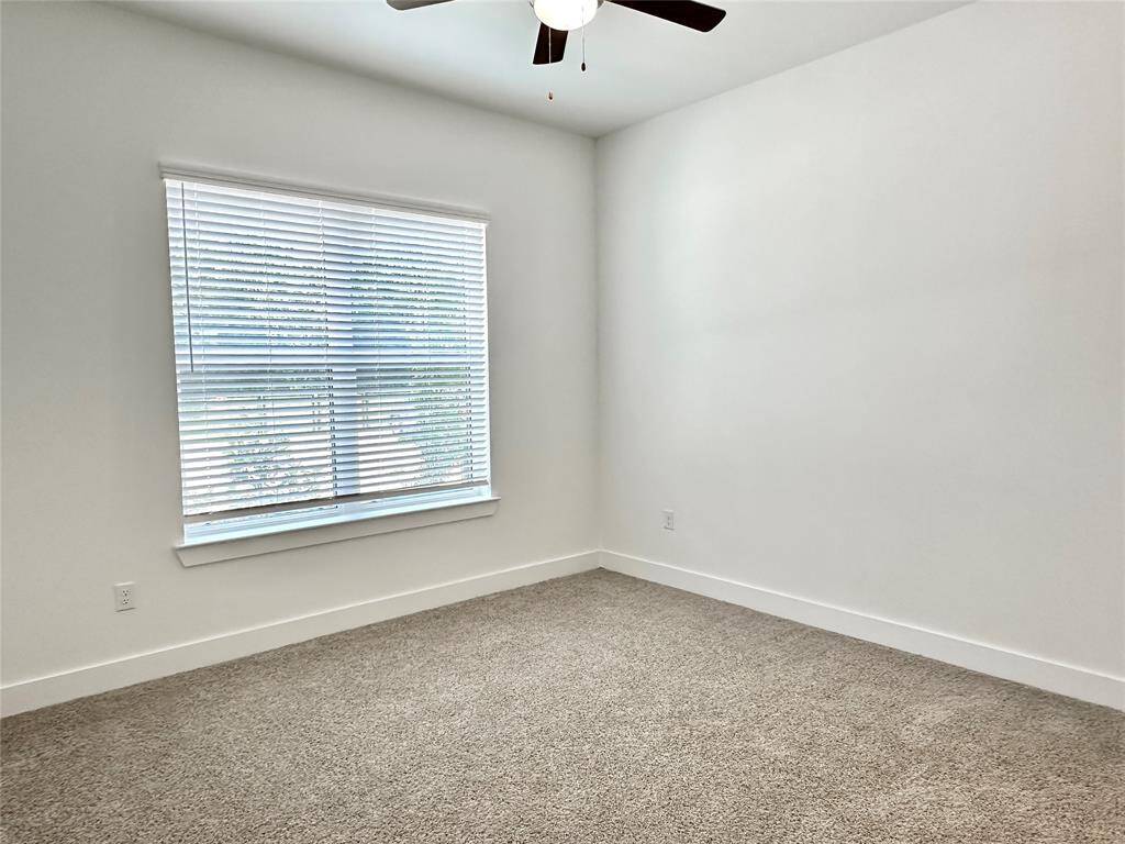 Spacious secondary bedroom with walk-in closet