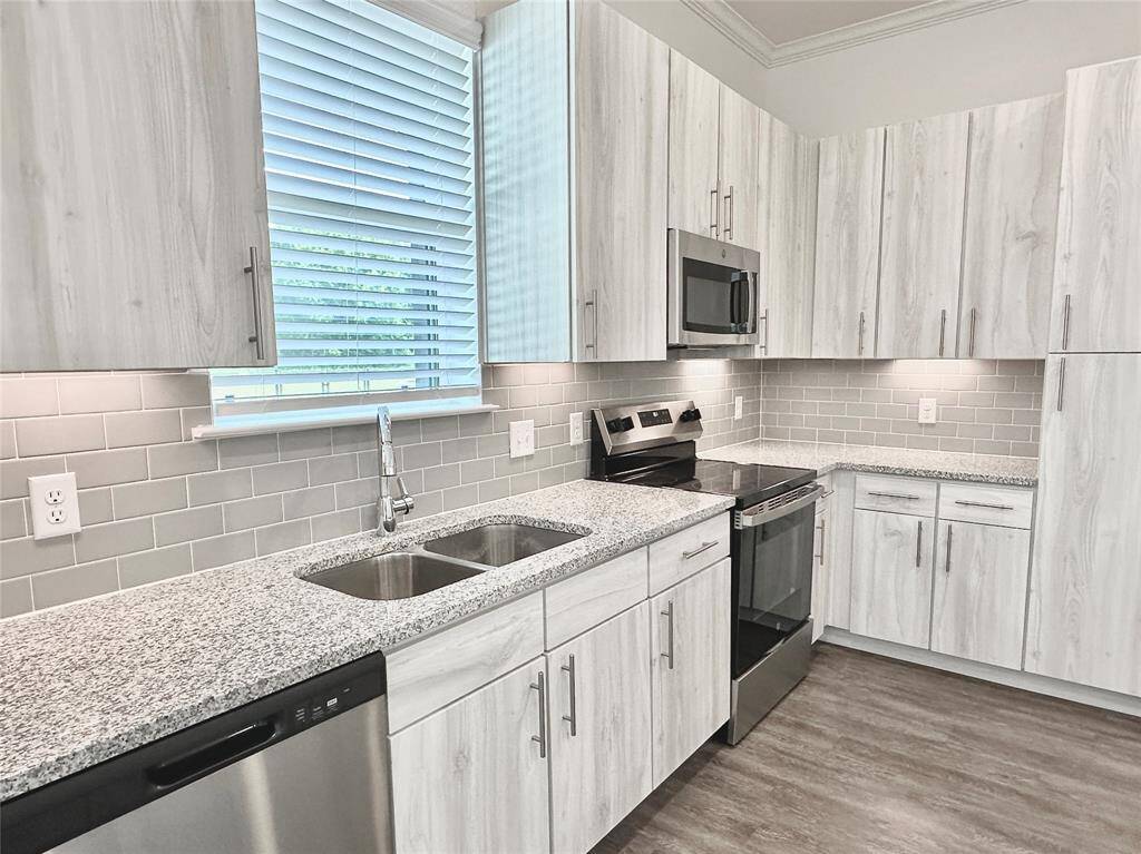 2 bed + 2 bath + study with fenced yard with interior views of dog park and amenities