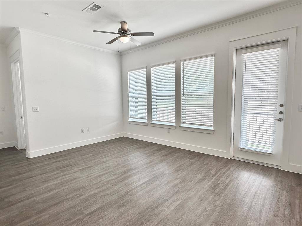 Large living room with lots of windows