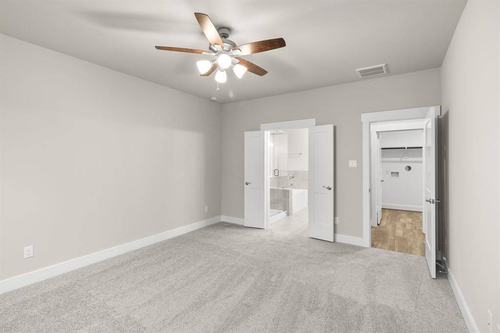 Here, modern elegance meets cozy comfort, creating a space that feels both fresh and inviting.