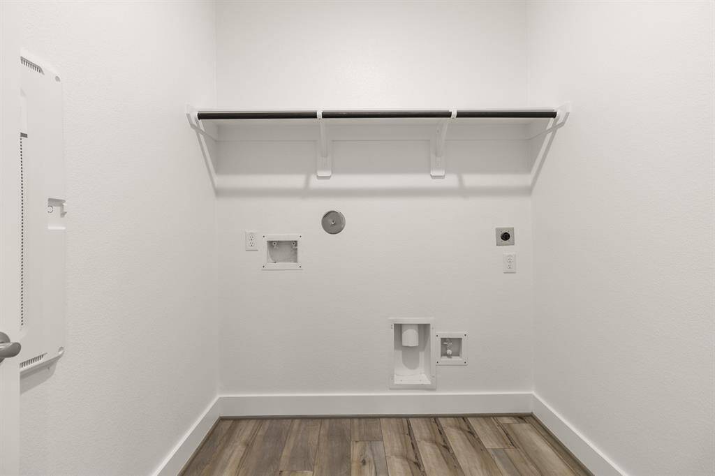 Whether you're sorting through the week’s clothes or preparing for a family gathering, this laundry room is designed to be a cheerful and functional part of your home, where every wash feels like a fresh start.