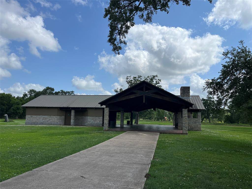 Here's the pavilion. The basketball court is to our left and the playground is toward the woods, beyond the pavilion.