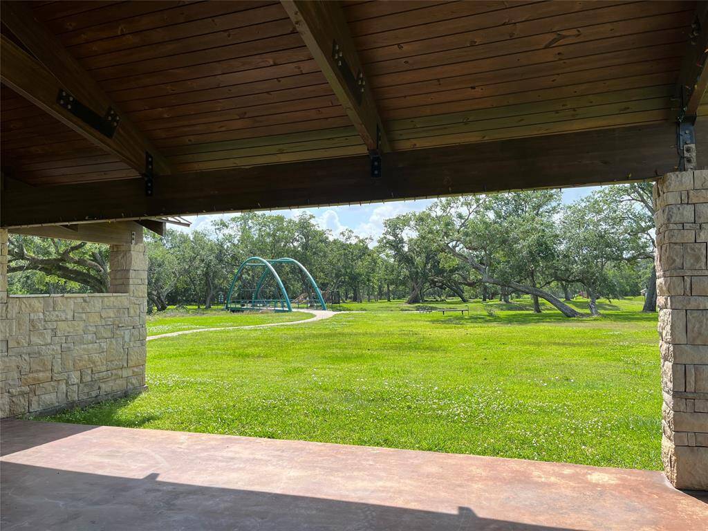 As you look out into the park, you see the bridge and amenities on the other side.
