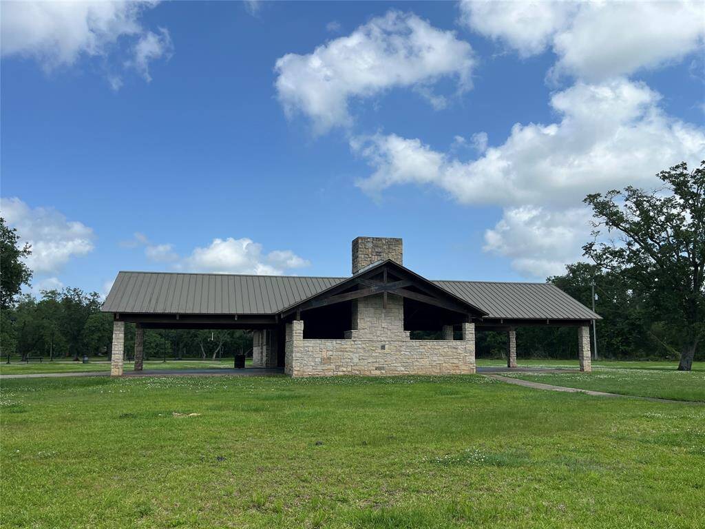 The party pavilion and basketball court. Basketball is toward the left rear corner, behind the edge of the pavilion.