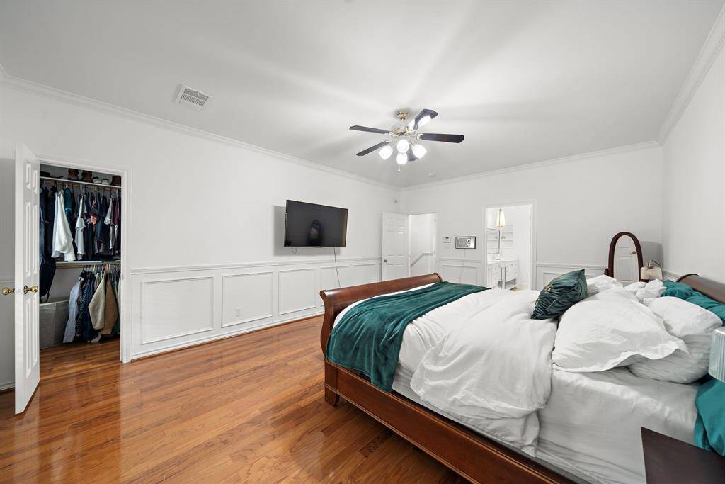 With 2 walk-in closets, the 'His' closet can be seen in this photo.