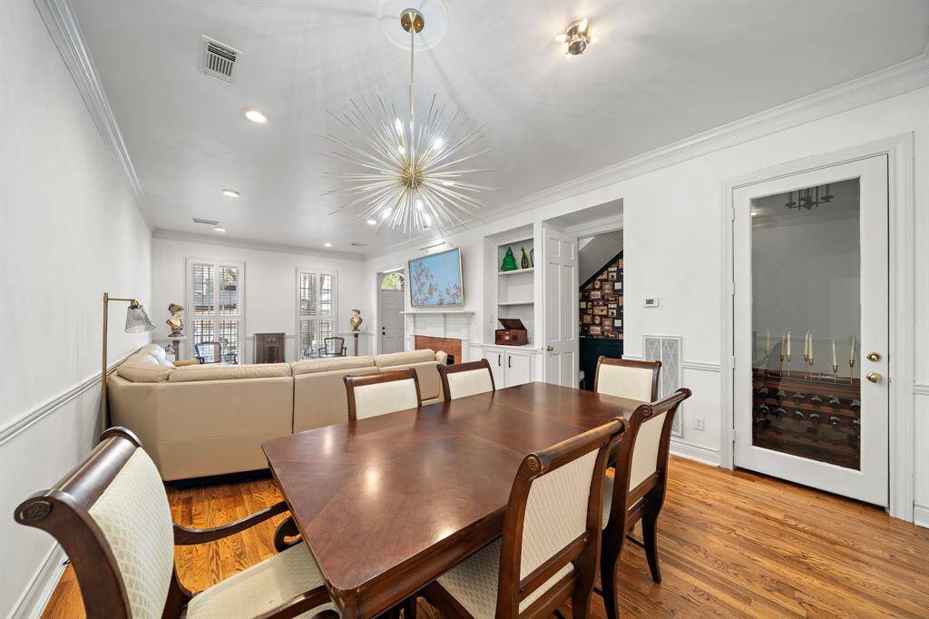 The dining area, notice the "wine room" through the glass door.