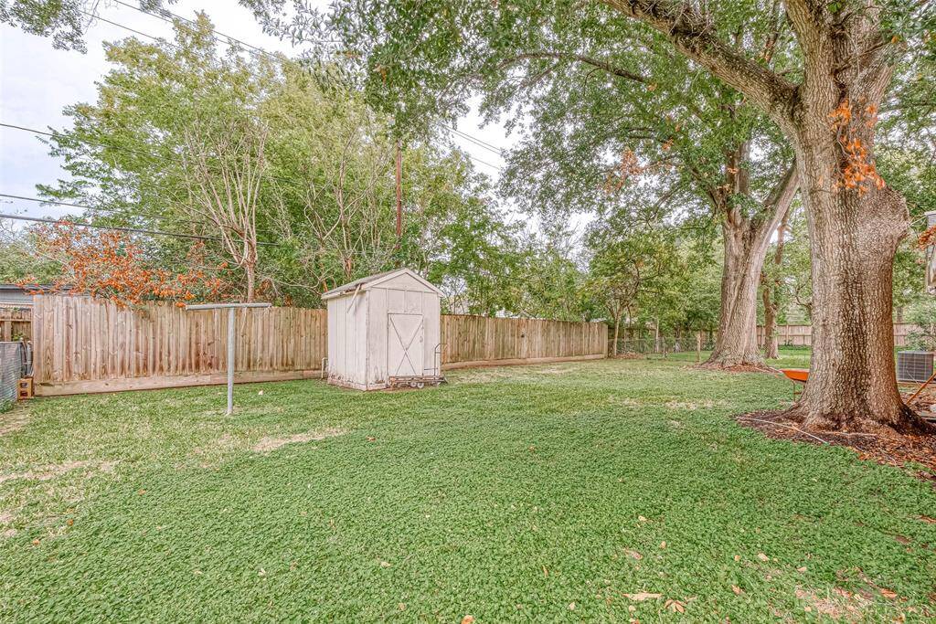 Enjoy the backyard with lots of shade.