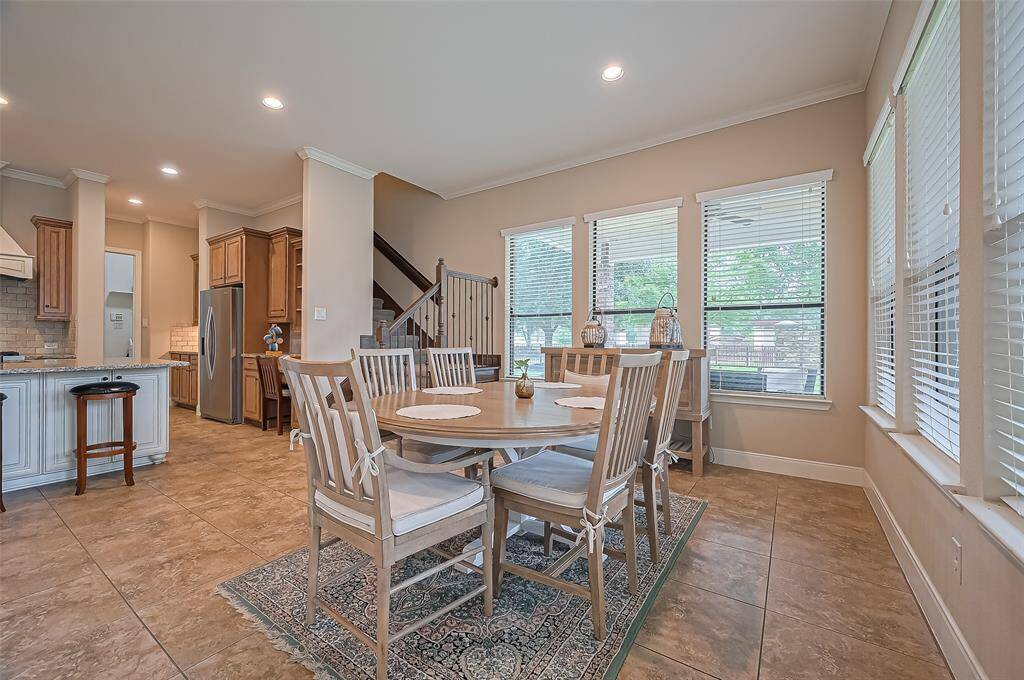 Cozy breakfast area filled with natural light—perfect for casual meals and morning coffee.