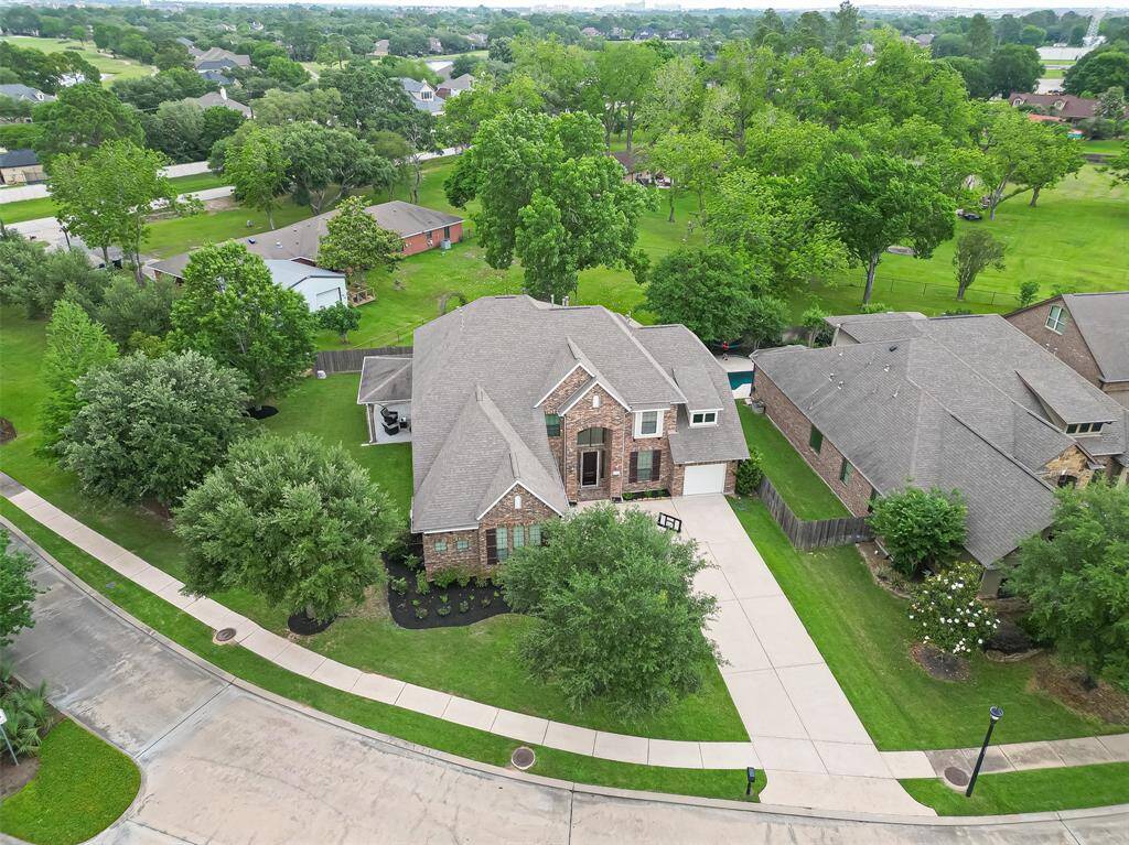 Surrounded by mature trees and just steps from the lake, this home offers a peaceful natural setting with scenic beauty all around.