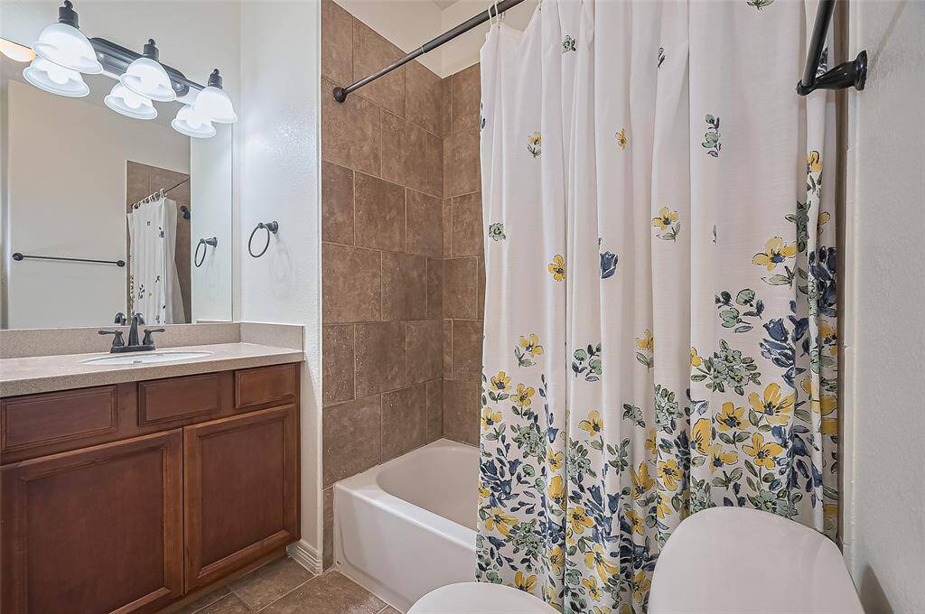 Enjoy the comfort of a private bathroom—perfectly attached to the secondary suite for ultimate privacy.
