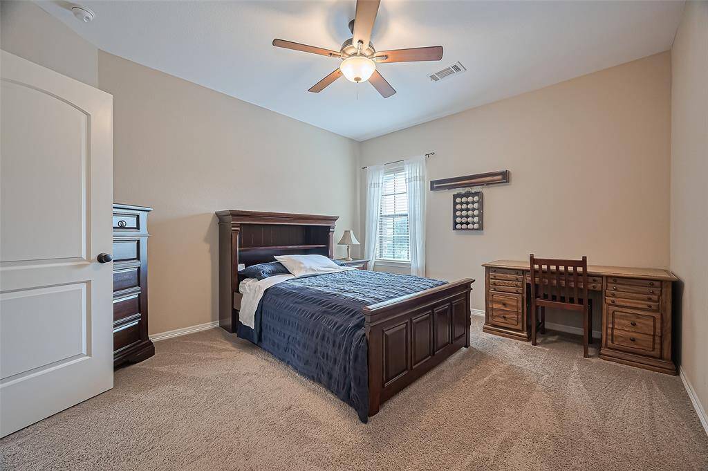 The third secondary bedroom shares a Jack and Jill bathroom with the adjacent bedroom—perfect for siblings or guests.