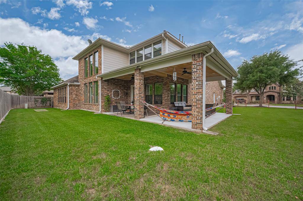 Oversized backyard provides ample space for any outdoor project—gardens, a pool, play areas, or entertainment zones.