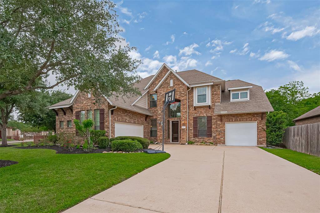 Beautiful mature trees provide shade, charm, and a sense of serenity to the property.