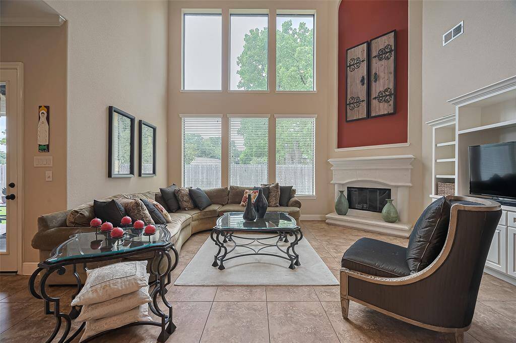 Impressive living area featuring expansive windows that showcase stunning views and bring the outdoors in.