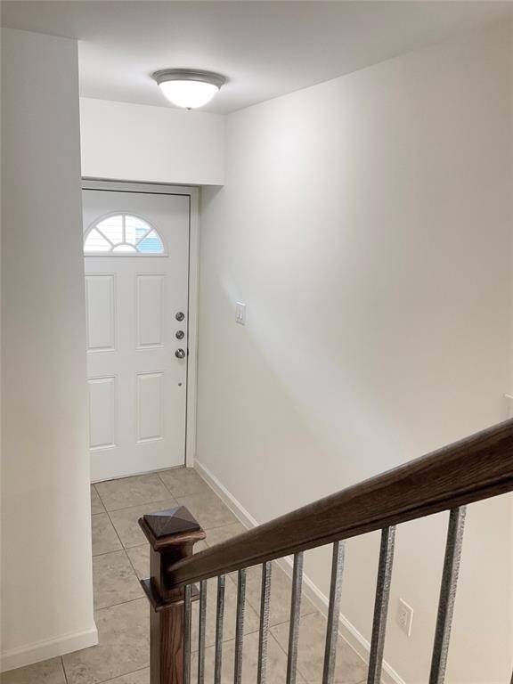 Wrought Iron staircase enhances the open feeling and desirability.