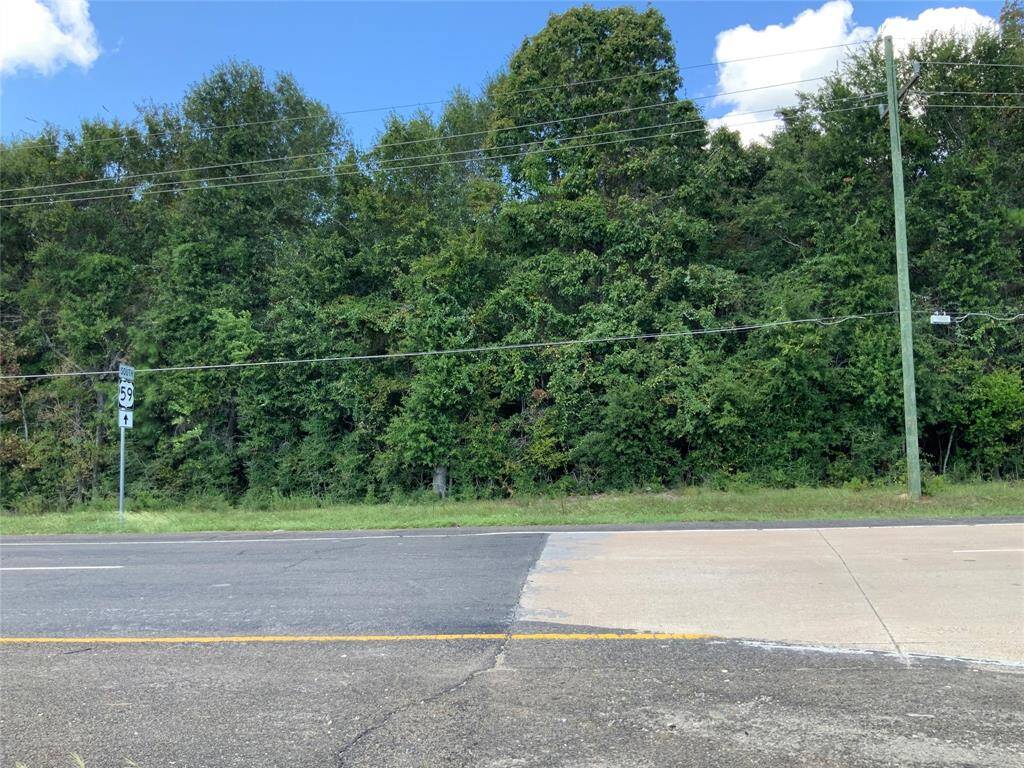 Left View of Property at the intersection of 59 Bypass and HWY 59 Southbound feeder.