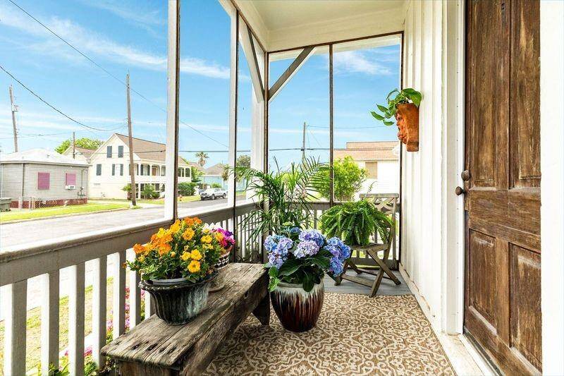 The front screened porch, off the 2nd BR, allows space for gardening and enjoying a morning coffee