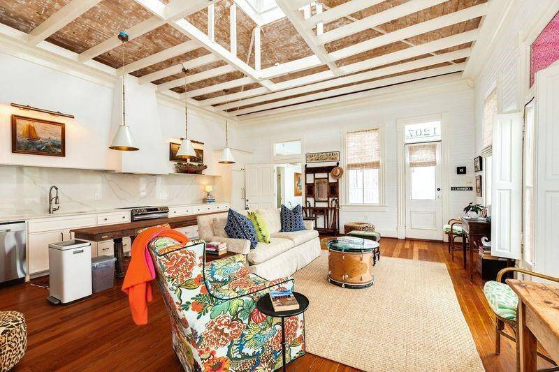 Exposed ceiling rafters adds interest to the room