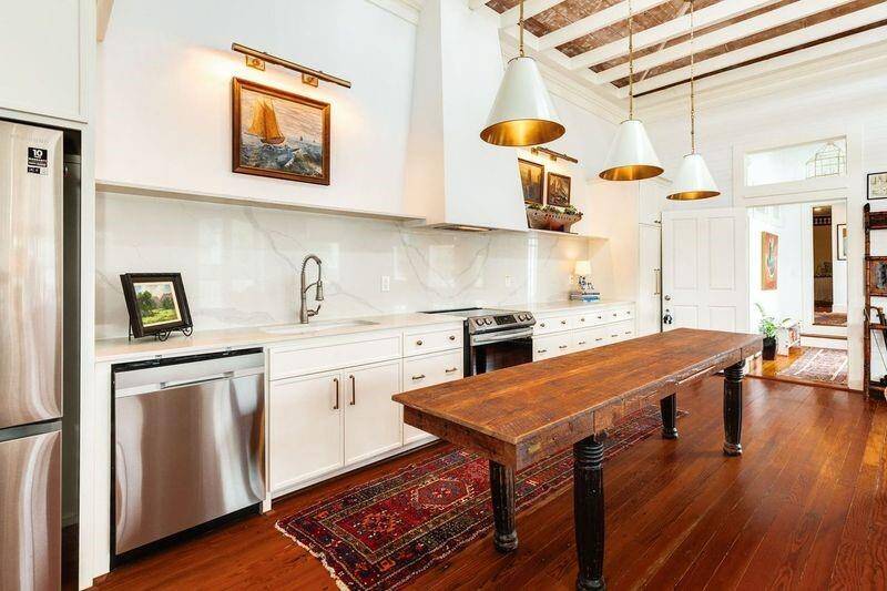 The remodeled kitchen adjoins the living room and is perfect for entertaining