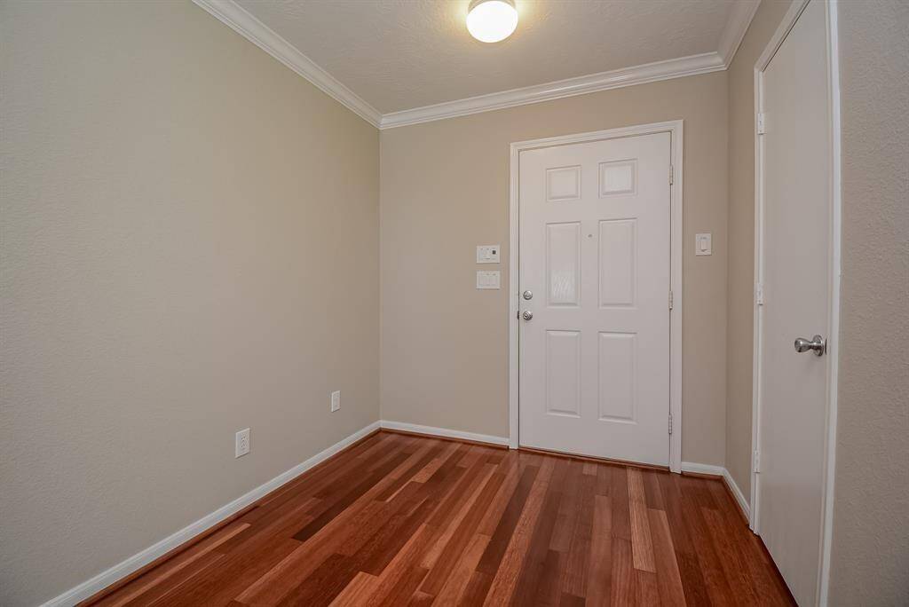 Entrance with coat closet conveniently located right by the front door