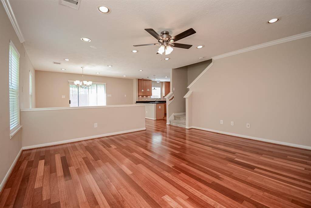 Beautiful, open entrance with hardwood flooring and lots of natural light