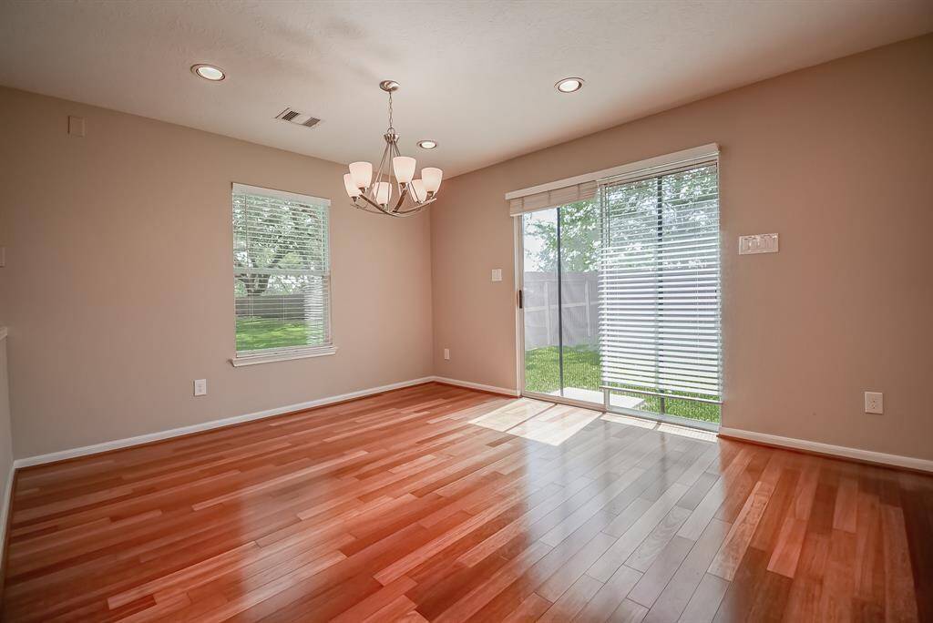 Dining room with access to backyard. Easy BBQ's and grilling!