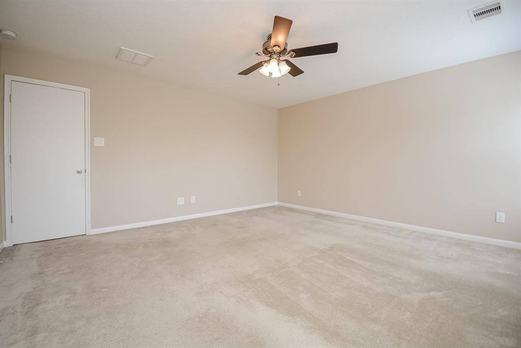 Primary suite with treetop views