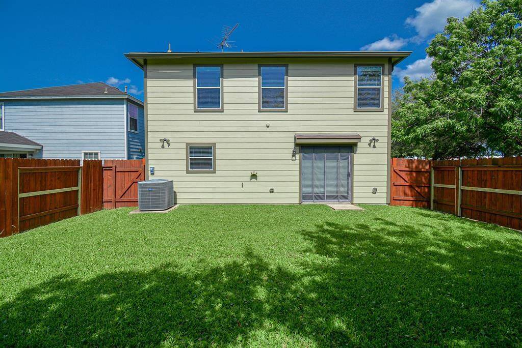 Gates on BOTH sides of the house. Gate on left leads to spacious area with concrete pavers to easily handle trash/recycling. Gate on right takes you directly to the community park. This home is truly one of a kind.