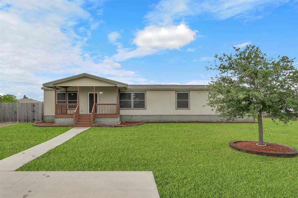 With a charming and classic exterior, this home is ready to make your own. The front drive-way is double-wide and can easily fit two cars.