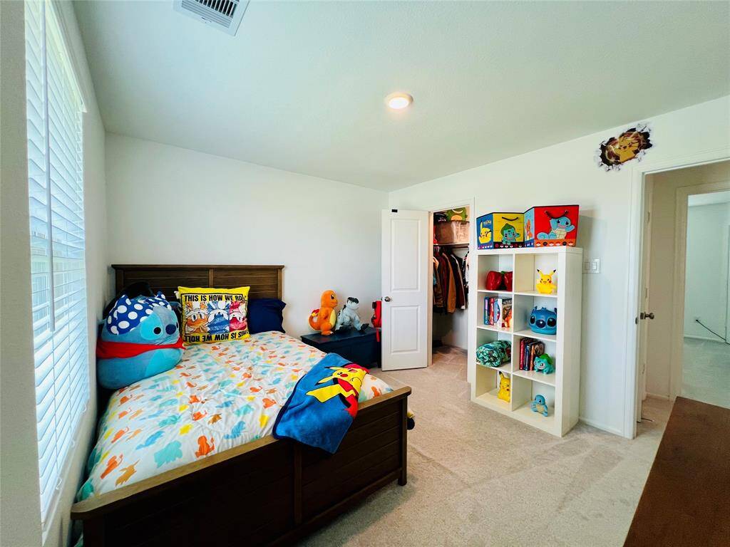 Bask in the abundant natural light filling this inviting room.