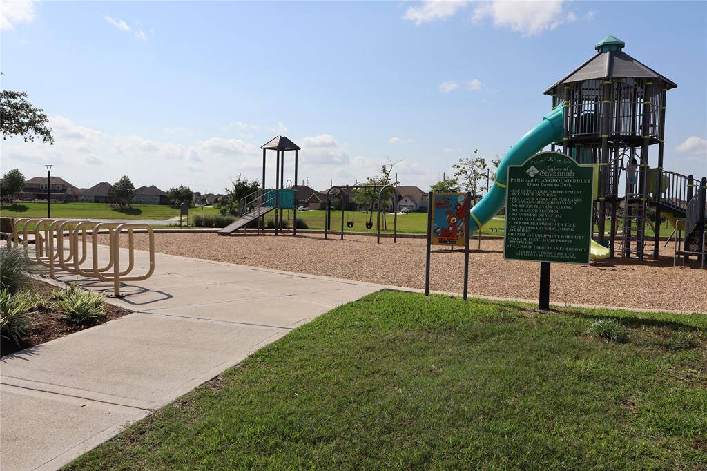 Many sitting benches along trail and inside the play tower.