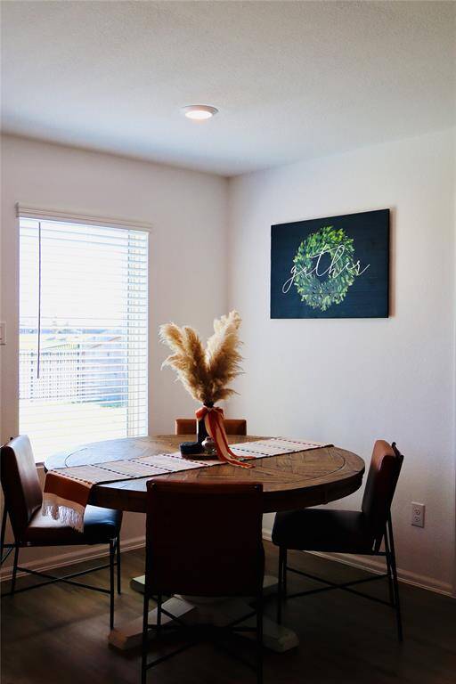 Enjoy stunning lake views from the breakfast nook's expansive window.