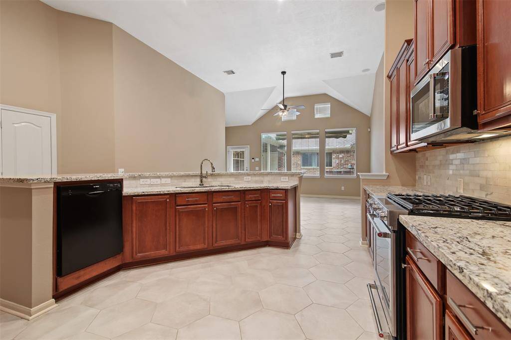 The kitchen is spacious and is open to the family room perfect for entertaining.