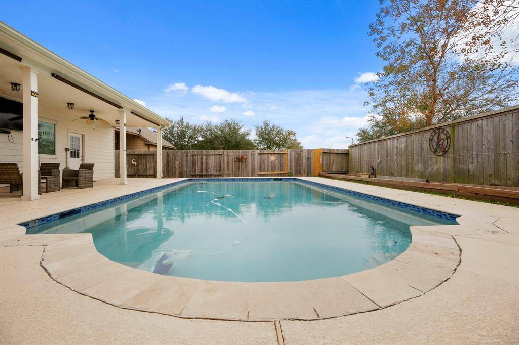 view of pool and the garden planters