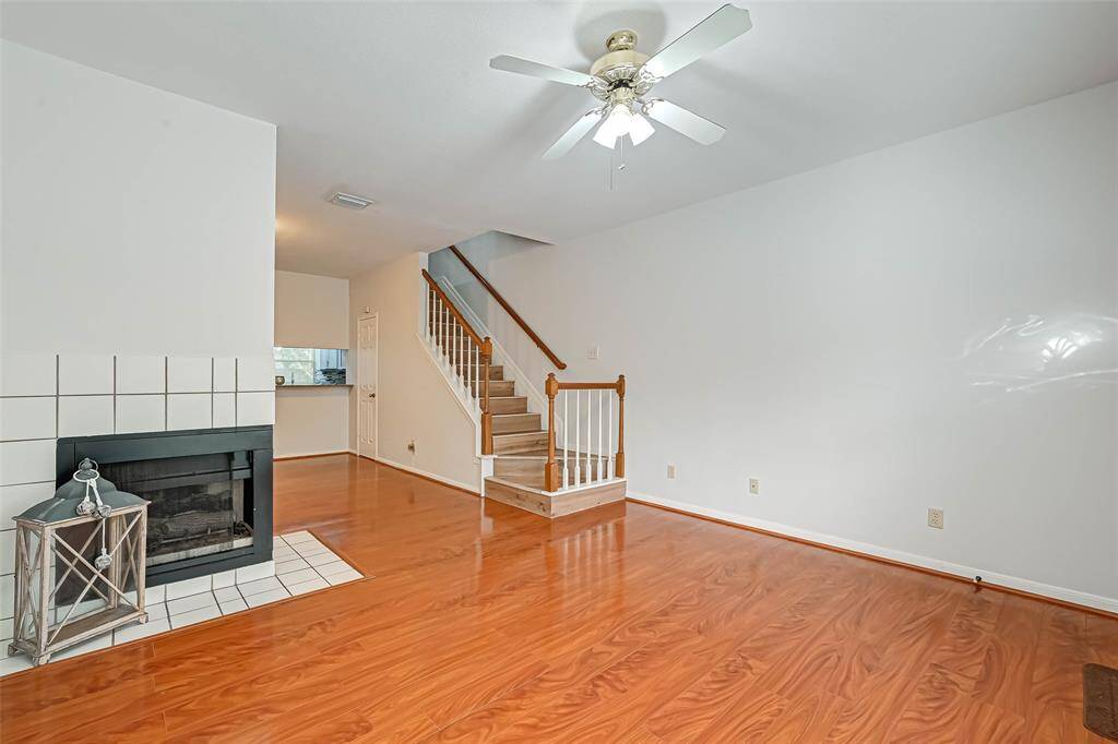 The living area, which is roomy and features a fireplace.