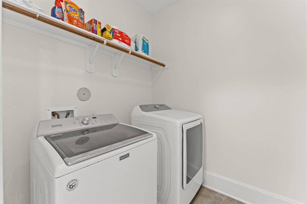 Utility room conveniently located in the house