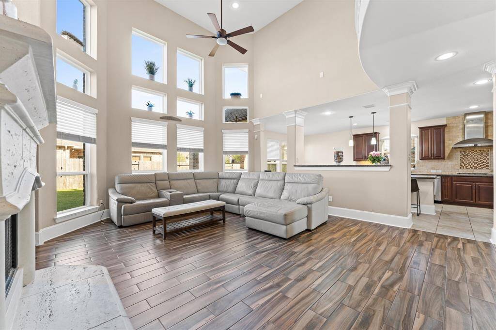 Just check this out. This Family room will be the center of your entertaining. The soaring ceiling emphasizes spaciousness