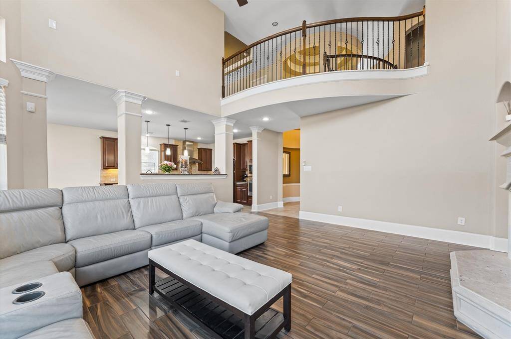 Elegant natural looking wood tile throughout in the family room