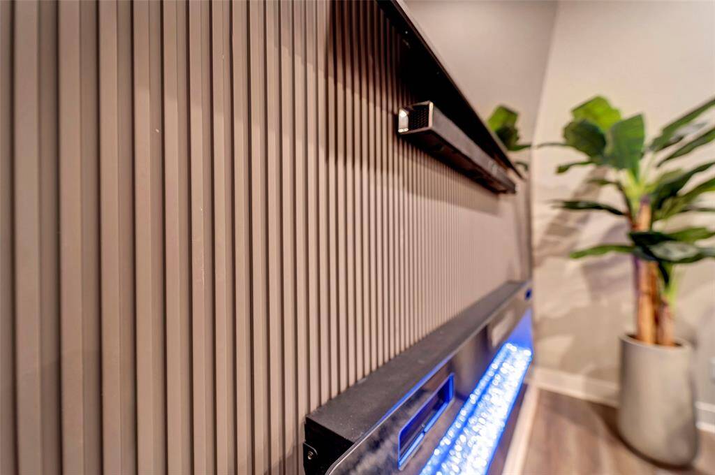 The decorative feature wall elevates the beauty of this room.