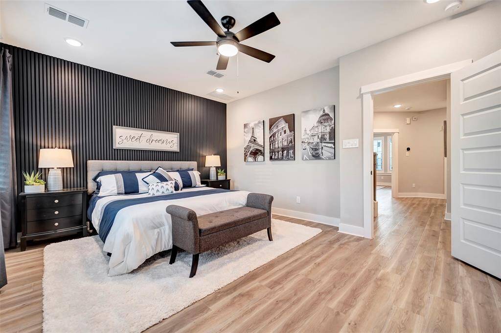 The primary suite is spacious & area allowing for a seating area if desired.