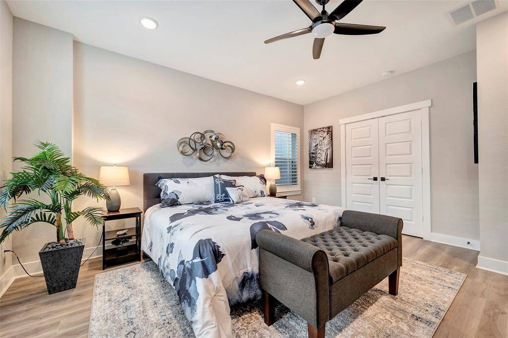 Each bedroom features dedicated large closet space and ceiling fans.