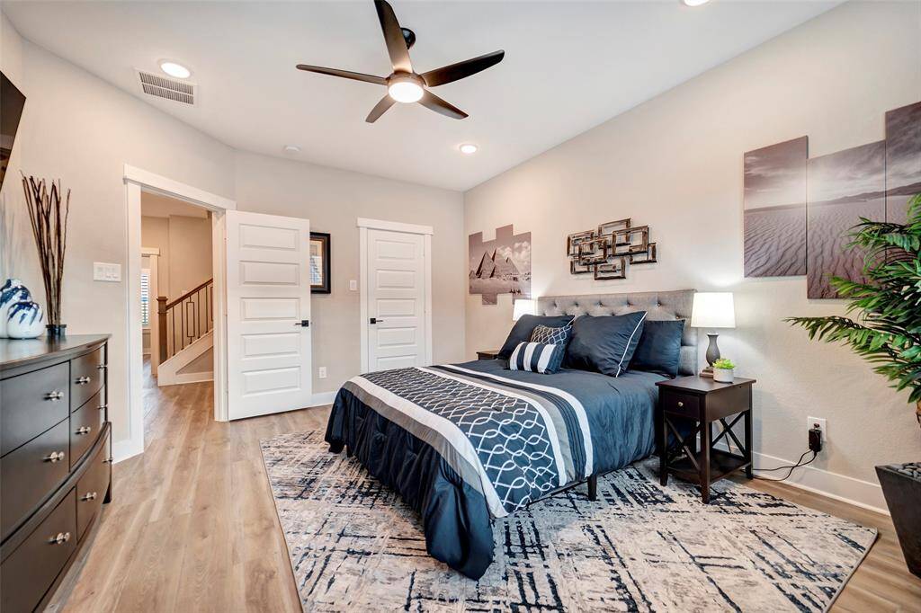 Bedroom 3 also features a ceiling fan and walk-in closet space.