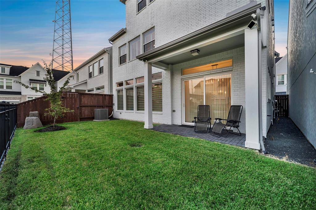 Hard to find in this community is a private, gated yard. This home comes complete with covered patio with grill line & wiring for TV give flexibility for its use. Se t on green space it allows the user the enjoy the tranquil area.