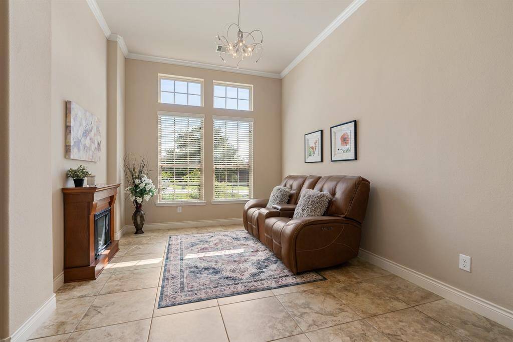 This is the formal dining room also located at the front of the house.  The room is currently being used as a wine room.  This would make a great playroom, additional living area, or office.  Make the space your own!