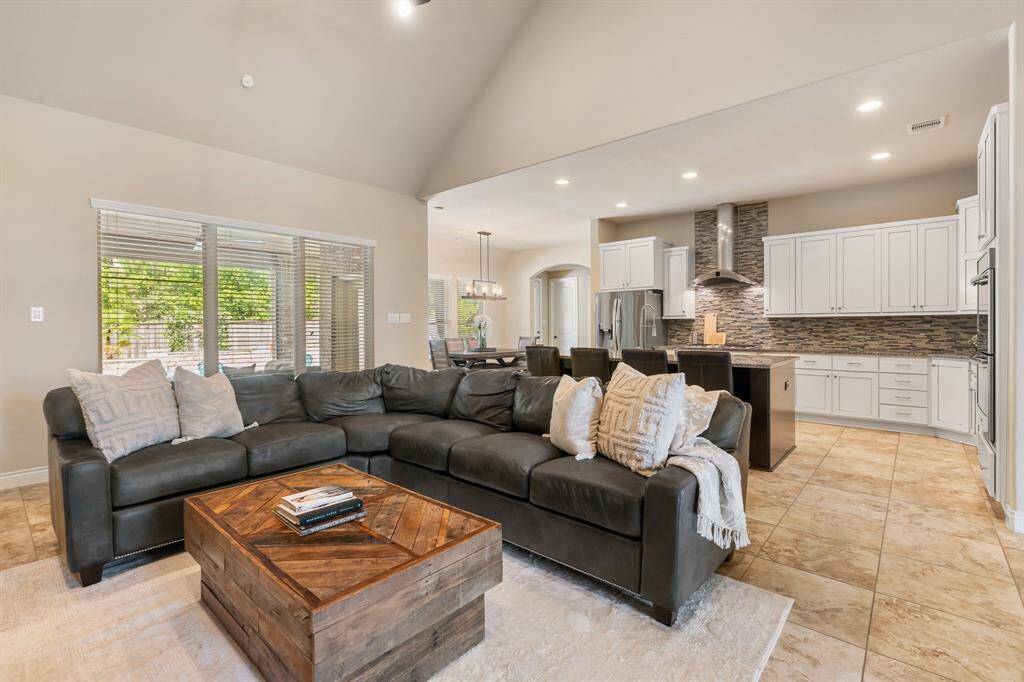 View of the family room looking into the kitchen and breakfast room.