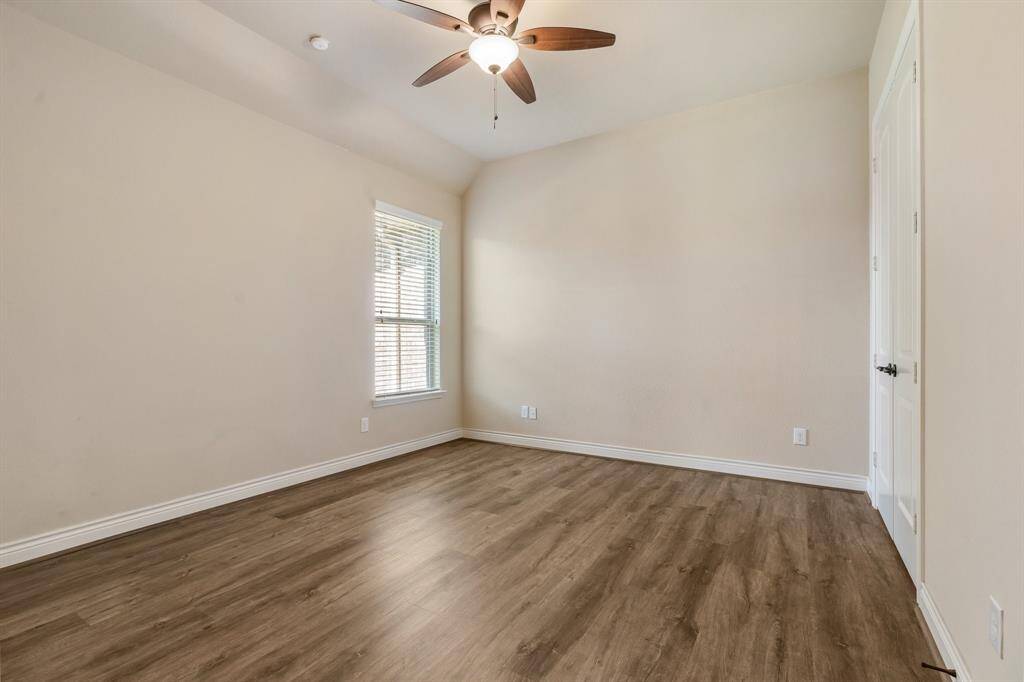 Bedroom 3 has luxury vinyl plank flooring and a Jack and Jill bathroom.  The secondary bedrooms have plenty of room to accommodate everything! There's no carpet anywhere in the home.