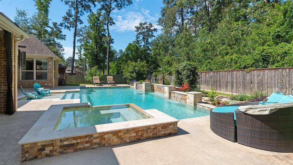 Oversized spa is located by the outdoor kitchen.  There's room for your friends!