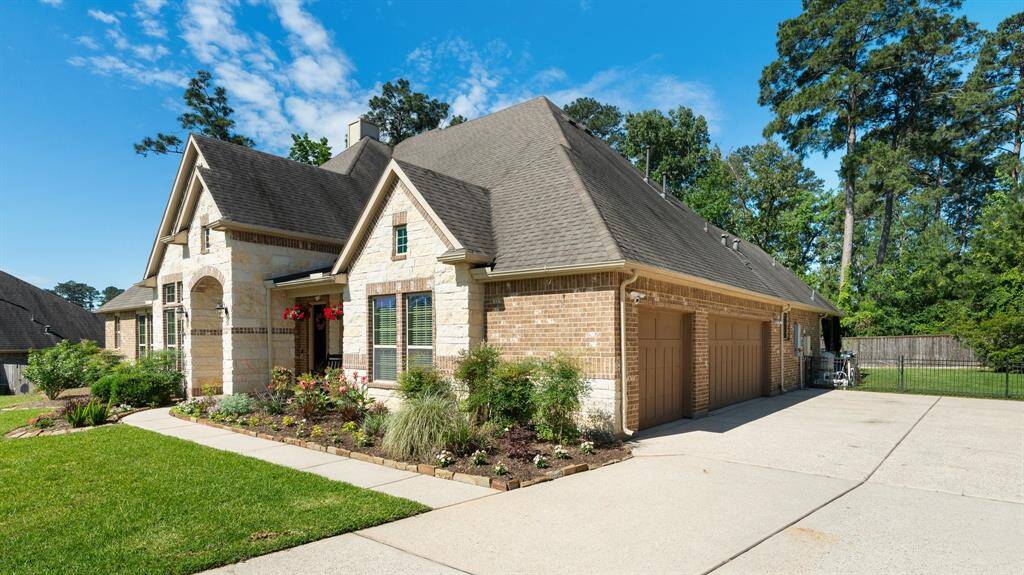 Oversized 3 car garage and double wide driveway provides ample space for family and friends to park when they are visiting.