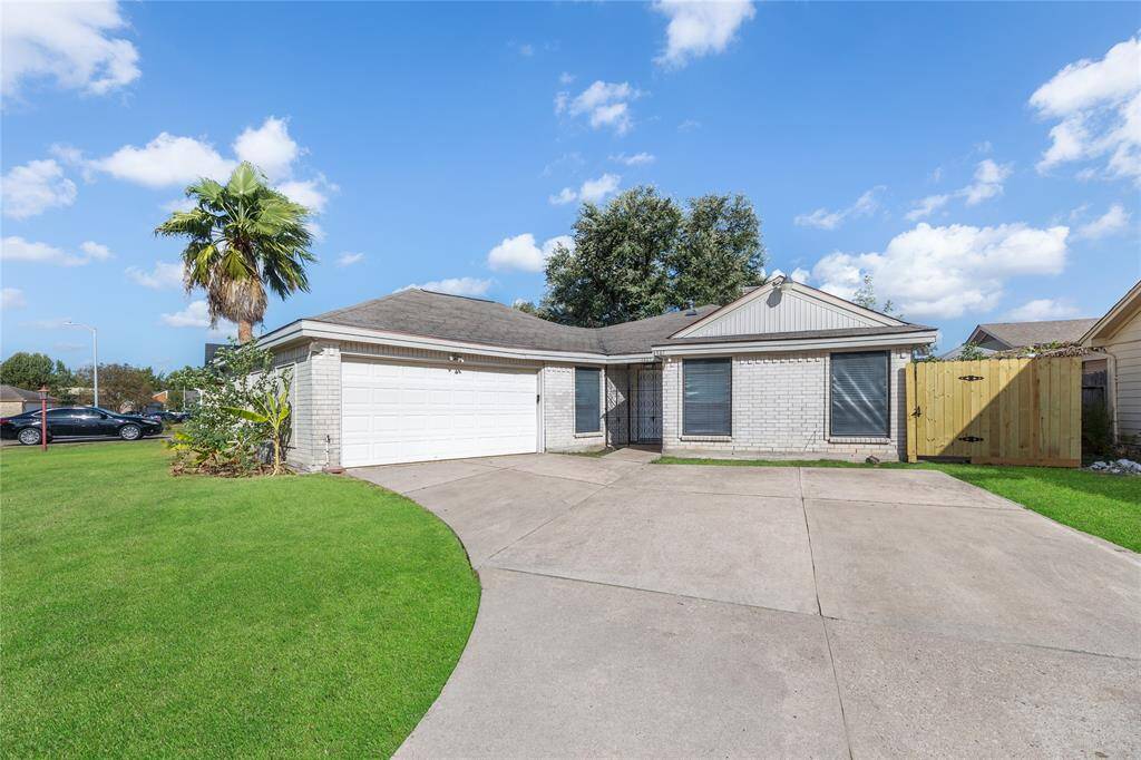 Numerous upgrades have been added in this beautiful home that has a nice brick facade, wrought iron front gate and side gate and a long driveway that has been freshly power washed.
